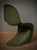 Classic and original chair from the Verner Panton line, in a strong olive green color, perfect and elegant as in its...