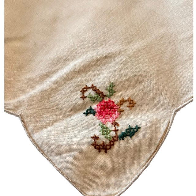 Beautiful, elegant hand-embroidered set of 6 cream napkins. They have a beautiful embroidered rose on one of the corners....