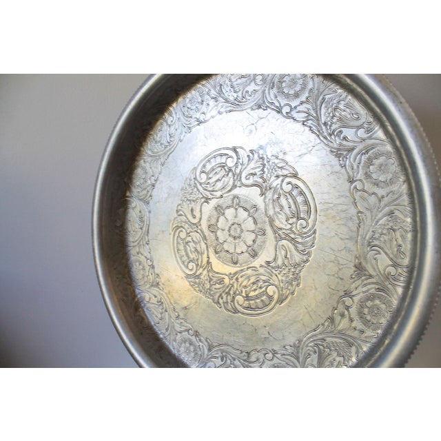 Vintage hand wrought etched aluminum tray by Wilson's Specialties. Makers mark on bottom. One dent on rim. Scuff marks.