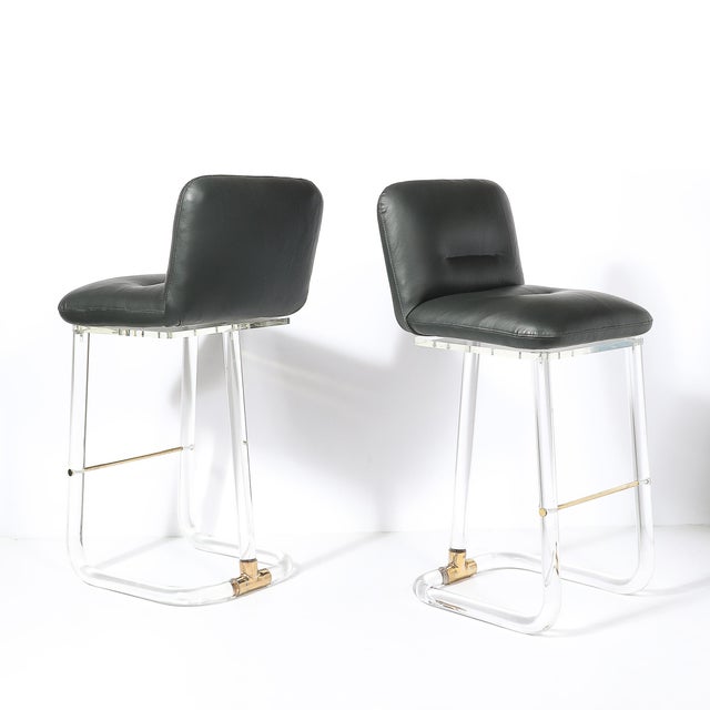 This pair of Mid-Century Modernist stools by Leon Frost perfectly showcases the sleek sophistication and innovative...
