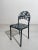 The chair is made entirely of steel and features the words "Hello" and "There" on the backrest and seat. The...