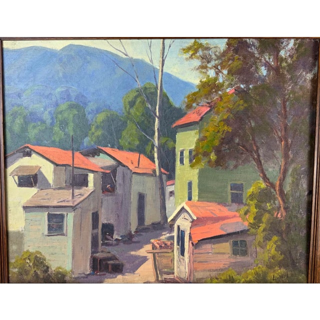 The vibrant red roofs on these homes make this plein air pop. A serene image of a charming little town in the hills is...