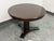 Design Plus Gallery presents a Plaza Table from Nancy Corzine. This round pedestal table shows the label’s polished...