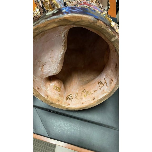 This stunning piece is a polychrome glazed ceramic sculpture of a Venetian masked lady, created in the workshop of the...