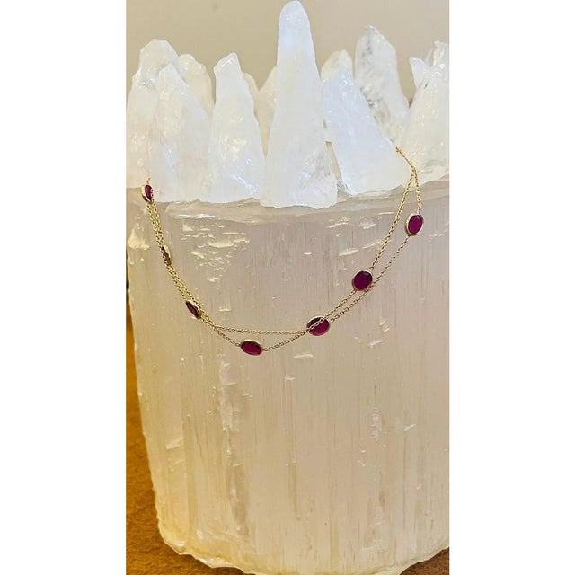 This Ruby Chain Bracelet in 18K gold showcases 1.78 carats of endlessly sparkling natural ruby. It measures 7 inches long...