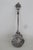 This gorgeously ornate Spoon is made out of silver-toned metal. This stunning statement piece presents an incredibly...