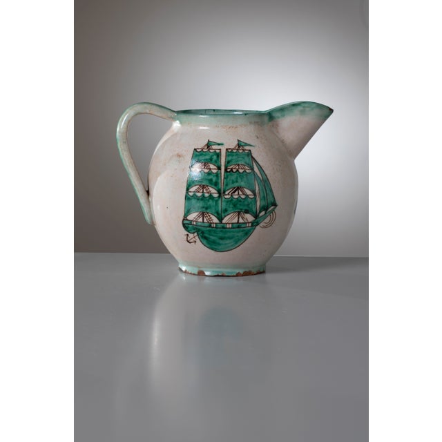 An extraordinary, museum-quality ceramic pitcher produced by the highly coveted M.A.C.S. (Manifattura Artistica Ceramica...