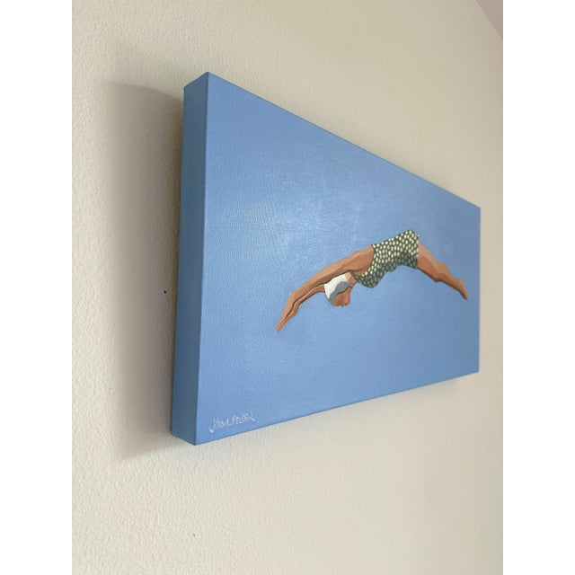 A graceful diver immediately brings feelings of weightlessness and ease to the viewer. Pointed fingers and toes imply a...