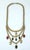 C.1980 scarab bib style necklace with gold tone chain link. The chain link necklace consists of three layers of double-...