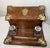 This antique 19th century English wood and bronze writing stand is a beautifully crafted piece that combines functionality...