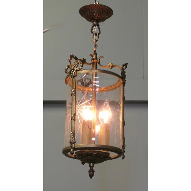 Delightful Art Deco Brass and Star Etched Glass Lantern This lovely light has a cylindrical glass etched with large and...