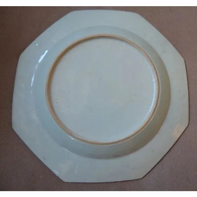 Antique 18th c. Chinese export porcelain octagonal plate in the Kangxi taste. Decorated with cabbage, flowers and rockwork...