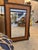 A substantial vintage wall mirror framed in richly toned woven bamboo mat with a clean slatted wood inner border — the...