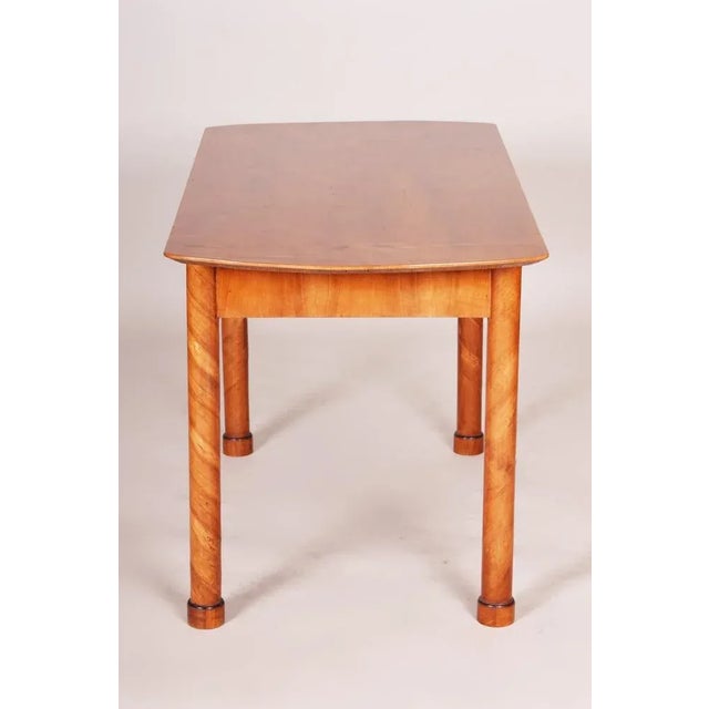 This item features classic Biedermeier elements. Visual simplicity, light-colored woods, and contrasting inlays...