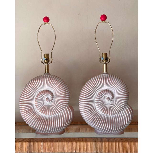 Pair of 1970s Mid Century Nautilus Shell Pottery Lamps Made in France in the style of Jean Charles Moreux Such a fun and...