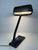 An ERPE notary lamp. Model 52. Cast iron base. Bakelite movable shade on a movable arm. No cracks. Copper/porcelain E27...