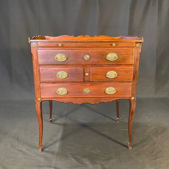 Beautiful details in this gem of a small chest of drawers! Found in France outside Paris, This French Regency 5-drawer...