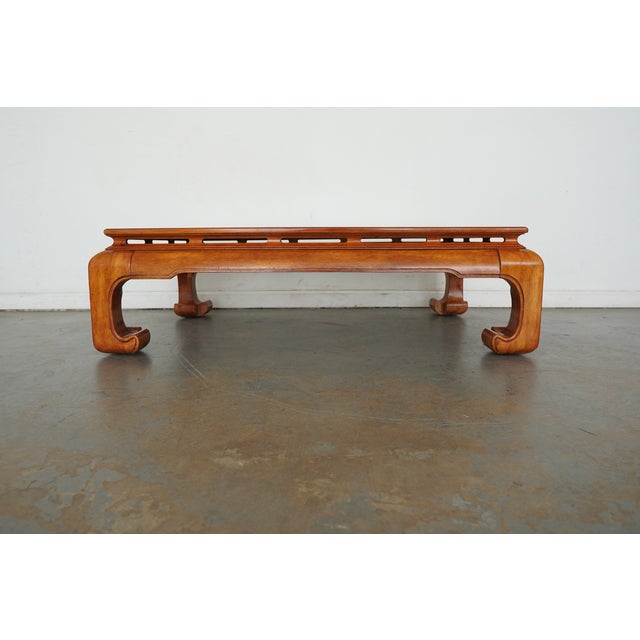 This vintage Asian-inspired coffee table by Century Furniture showcases the sculptural silhouette and refined detailing...