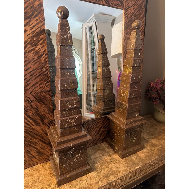 Lovely pair of obelisks decorated in our artists take on faux porphyr.