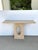 Stylish Currey & Co Demi Travertine Console Table. Sculptural Base with oval design. Original Retail $7490. Showroom Floor...