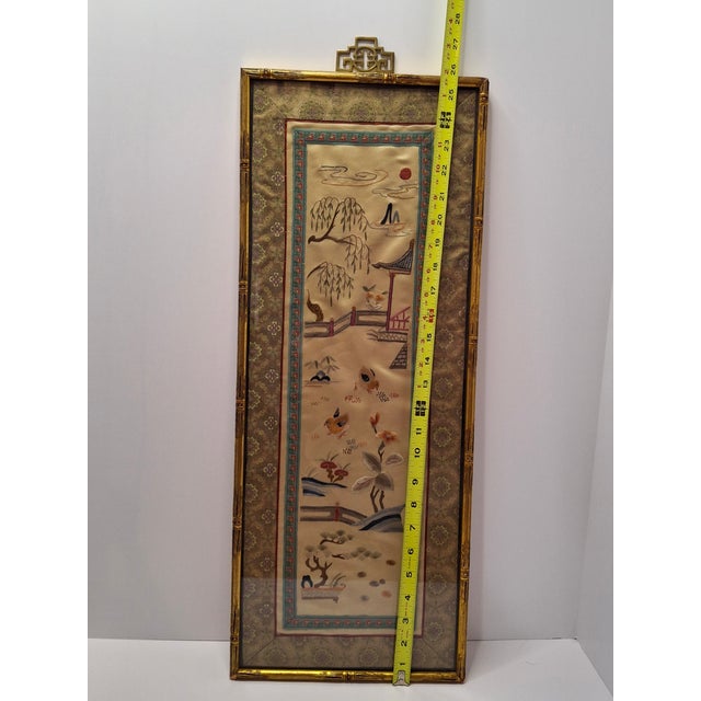 This exquisite antique Chinese silk embroidery features a vertical landscape composed of traditional Qing Dynasty...