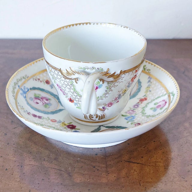 Traditional Antique Meissen Porcelain Teacup and Saucer Set Depicting Roses in Gold Lattice With Twisted Handle For Sale - Image 3 of 10