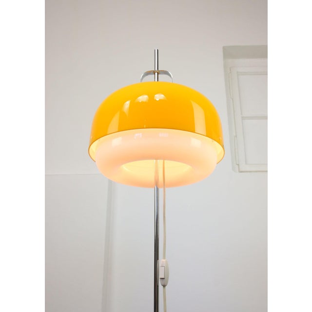 Rare specimen in yellow colour. Adjustable height of the shade. Long electric cable. Two e14 light bulbs (not included)....