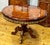 Luxury French Round Dining Table – Rich Wood Finish With Ornate Gilded Ornament For Sale - Image 4 of 4