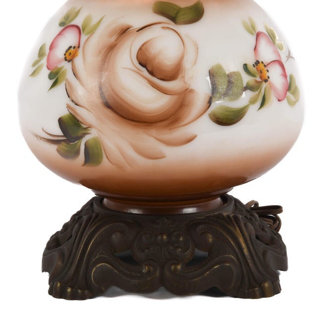 This Falkenstein Hurricane Lamp Base with Decorated Flowers has vintage charm with its romantic floral motif and ornate...