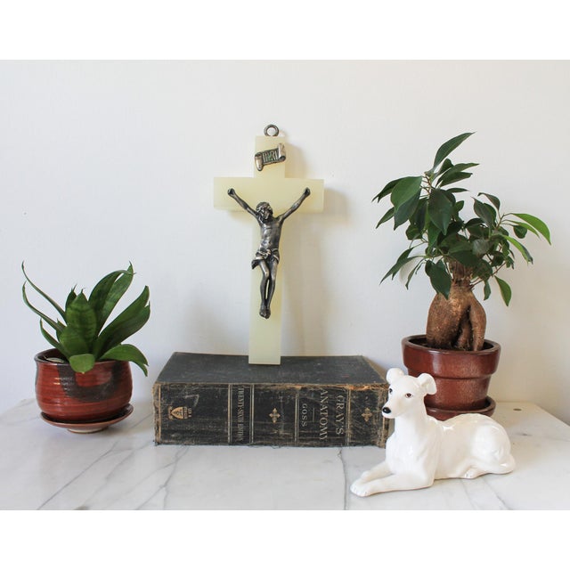 Vintage white heavy marble? crucifix. Weighs approx. 3lbs. There is a hook on top for hanging. No makers mark. Two small...