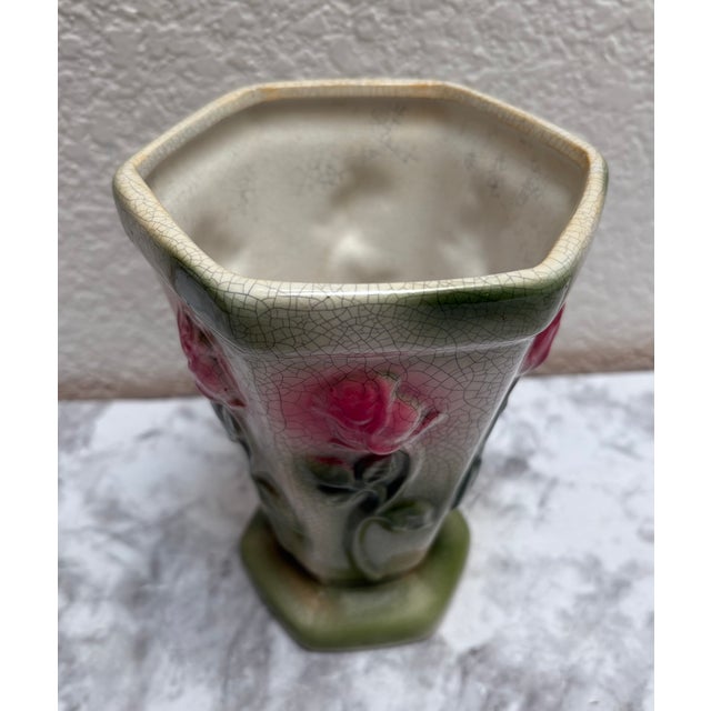 Vintage 1950s textured floral crackle glazed vase. Faded rose motif pattern with leaves and stem against a crackled glazed...