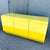 A bold and sculptural Postmodern waterfall dresser, finished in an electrifying high-gloss yellow laminate that instantly...