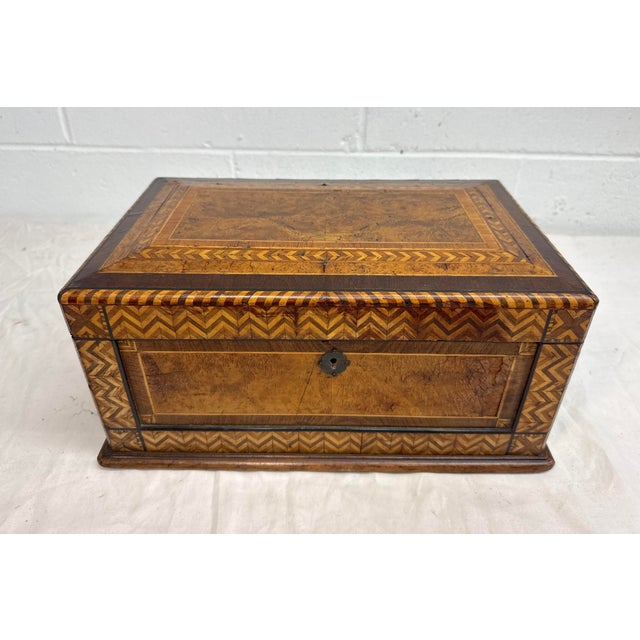 Up for sale is a very high quality antique 19th century handmade parquetry wooden sewing/jewelry box. The piece has very...
