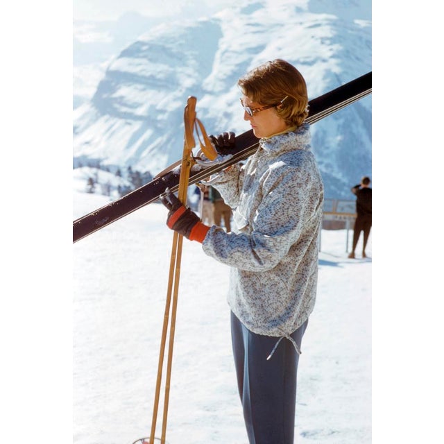 Ski Parkas by Toni Frissell An admiring view from the top of a piste in a parka jacket, 1956. (Photo by Toni Frissell)...