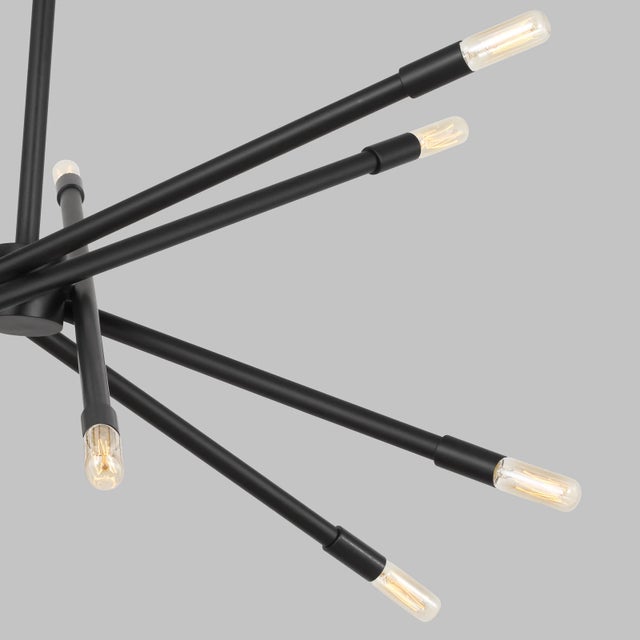 A geometric design lends elegance to this contemporary sputnik sphere chandelier. The Eastyn series by Chapman & Myers was...