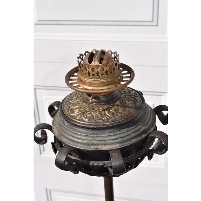 Antique Adjustable Wrought Iron Floor Oil Lamp. Marked Duplex & B&H Mfg.on lamp and Patapldfor on frame. Very good antique...