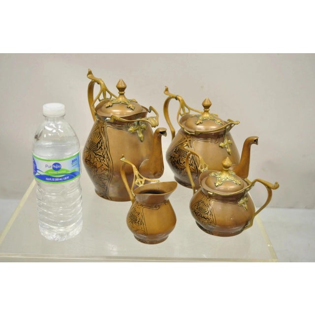 Antique Carl Deffner Copper German Art Nouveau Thistle Tea Set - 4 pc Set. Circa Late 19th Century. Measurements: Tea Pot:...