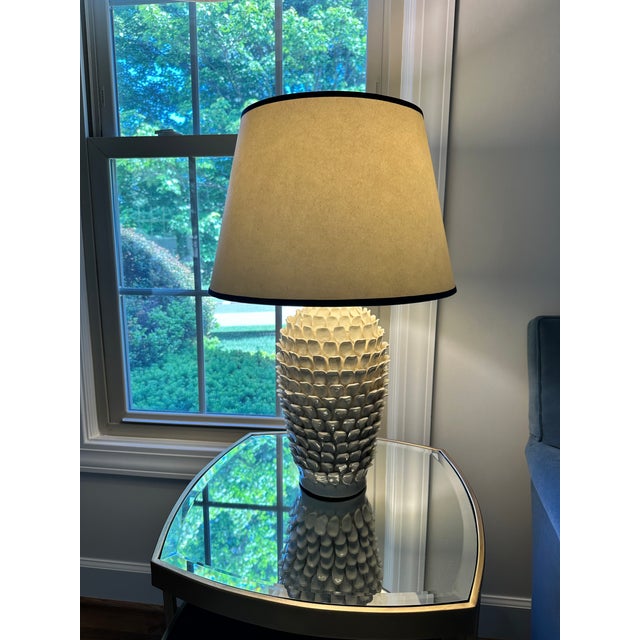 Stucco table lamp in "stone" ceramic with 16 inch straight empire shade in top n tail cream card with navy blue tape. Just...
