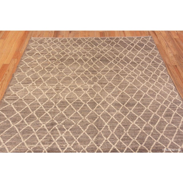 A Highly Decorative Modern Room Size Grey Abrash Background Ivory Tribal Geometric Honeycomb Pattern Area Rug, Country of...