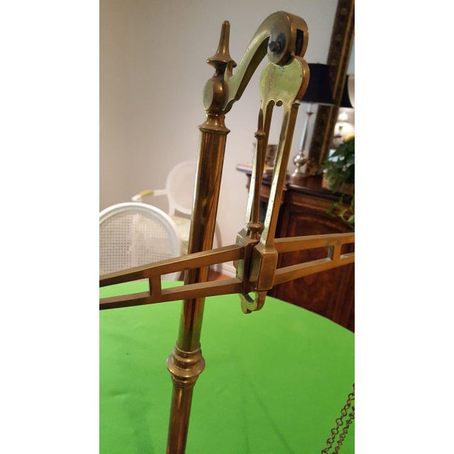 19th Century English Antique Brass Weight Scale. The wood base is 12 inches x 21 inches and 28 inches tall.