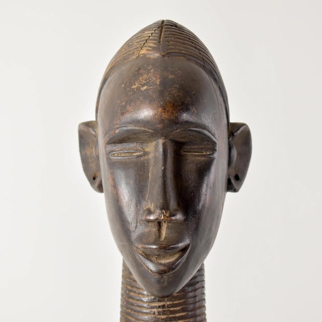 The elongated proportions and the graceful posture of the figure evoke a sense of poise, beauty, and balance, highlighting...