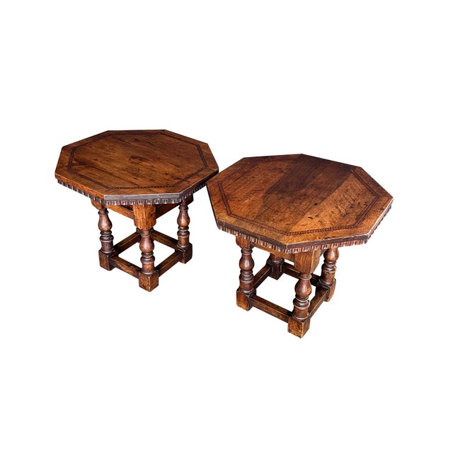each rustic 17th Century style table of solid oak featuring an octagonal top with complimenting geometric inlaid perimeter...