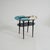 This charming and quirky 1950s side table has a unique design, featuring a striking blue and white top with circular...