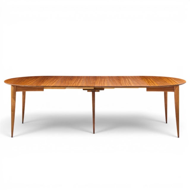 Gio Ponti for Singer & Sons Model 2135 Mid Century Walnut Expanding Dining Table with 4 Leaves This table measures: 48...