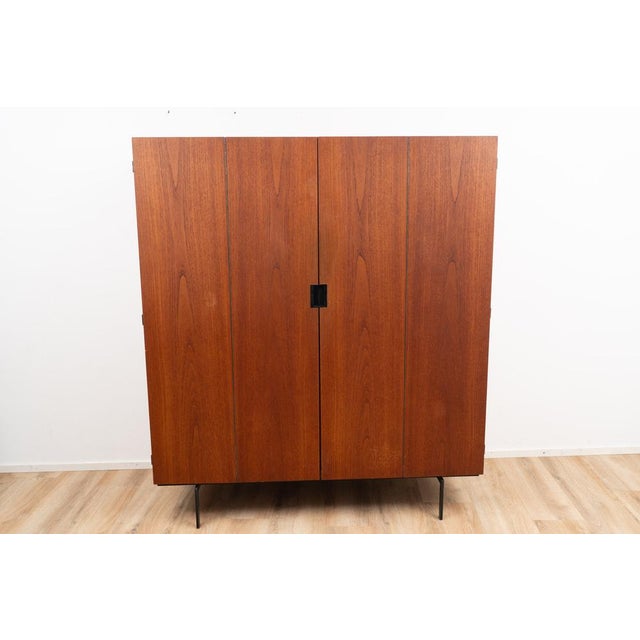 KU14 Wardrobe by Cees Braakman for Pastoe. The Wardrobe comes with multiple storage compartments. I have official proof of...