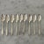 Assorted 24-piece collection of vintage silver-plated flatware by Nobility Plate. The utensils feature an elegant,...