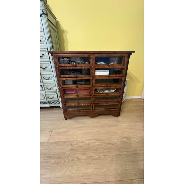 Amazing and rare antique haberdashery with 12 glass drawers for displaying all your favorite items at home or in a shop....