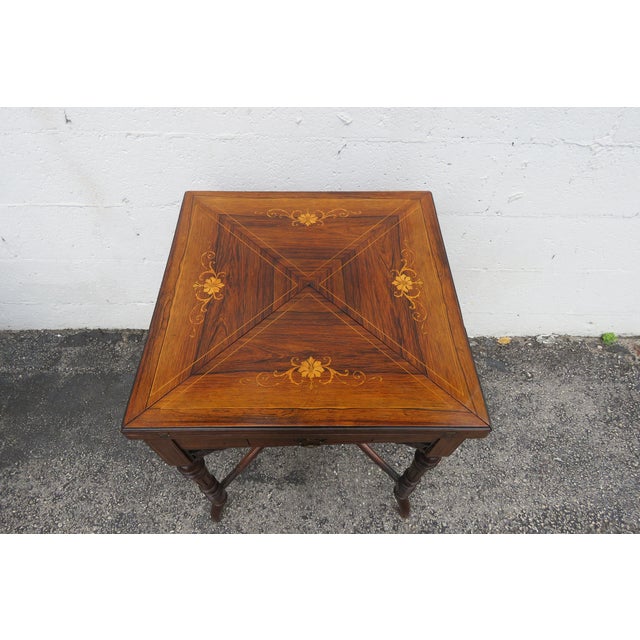 This Card Table is made of wood, solid wood, rosewood, and veneer. This wonderful table was made in the late 1800s, it has...