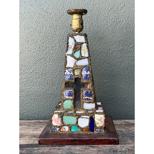 This extraordinary vintage table lamp is a rare example of pique assiette mosaic folk art, a technique that breathes new...