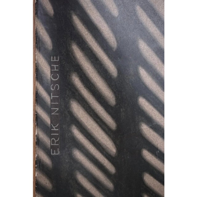 This poster was designed by Erik Nitsche in Switzerland in the 1950s for General Dynamics, an US armaments company. It...